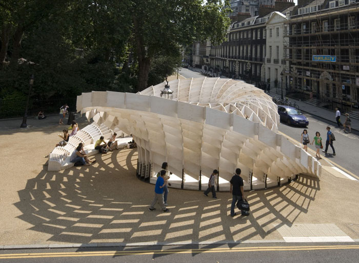 Τhe Swoosh Pavilion in Bedford Square in London, Image source: https://woodarchitecture.wordpress.com/woodtechnology/summer-wood-design-pavillion/